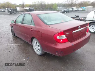2004 Toyota Camry LE with VIN 4T1BE32K04U314445, listed as a IAAI auction lot 42017413 with 137,702 mi miles. Bid and sale history available at carsss.com. Image 3.