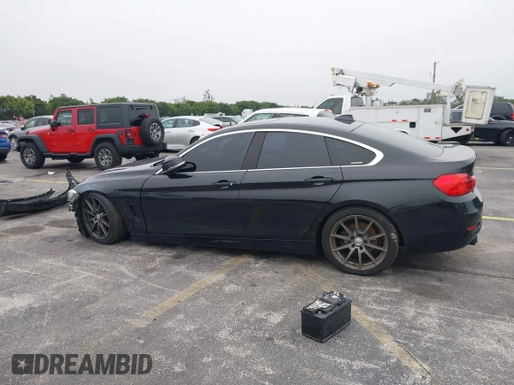 2016 BMW 4 Series 428i xDrive with VIN WBA4C9C58GG136248, listed as a IAAI auction lot 41346270 with 129,464 mi miles and . Bid and sale history available at carsss.com. Image 15.