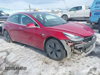 2018 Tesla Model 3 Long Range Battery with VIN 5YJ3E1EB0JF064041, listed as a IAAI auction lot 41562239 with 54,720 mi miles and . Bid and sale history available at DreamBid. Image 1.