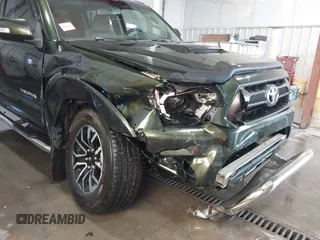 2012 Toyota Tacoma with VIN 3TMLU4EN2CM094154, listed as a IAAI auction lot 41322227 with 270,712 mi miles and . Bid and sale history available at DreamBid. Image 6.