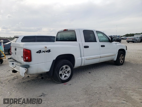 2005 Dodge Dakota SLT z VIN 1D7HW48N15S366026, wystawiony jako Copart lot #55510125 z przebiegiem 66 963 mil mil oraz Czysty tytuł • Clean title. Historia ofert i sprzedaży dostępna na DreamBid. Obrazek 3.
