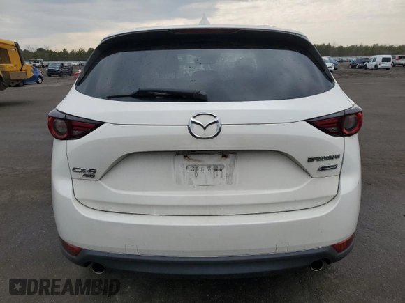 2017 Mazda CX-5 Grand Touring with VIN JM3KFBDL1H0208186, listed as a Copart auction lot 52685955 with 125,414 mi miles and Salvage Title. Bid and sale history available at carsss.com. Image 6.