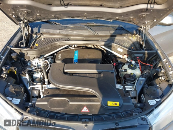 2016 BMW X5 xDrive40e with VIN 5UXKT0C57G0S75476, listed as a IAAI auction lot 41642249 with 105,489 mi miles and . Bid and sale history available at DreamBid. Image 10.