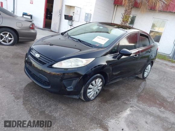 2012 Ford Fiesta S with VIN 3FADP4AJ0CM100103, listed as a IAAI auction lot 41854642 with 144,661 mi miles. Bid and sale history available at carsss.com. Image 2.