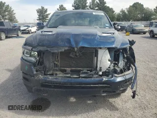 2021 Ram 1500 Laramie z VIN 1C6SRFJT3MN808479, wystawiony jako Copart lot #56600935 z przebiegiem 70 336 mil mil oraz Szkoda całkowita • Salvage title. Historia ofert i sprzedaży dostępna na DreamBid. Obrazek 5.