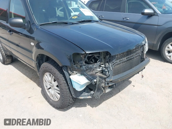 2006 Mercury Mariner Convenience with VIN 4M2YU56Z66KJ04591, listed as a IAAI auction lot 42469116 with 174,952 mi miles and . Bid and sale history available at DreamBid. Image 6.