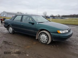 1995 Ford Taurus GL with VIN 1FALP52U1SA108202, listed as a Copart auction lot 85676434 with 102,669 mi miles and Salvage title. Bid and sale history available at DreamBid. Image 4.