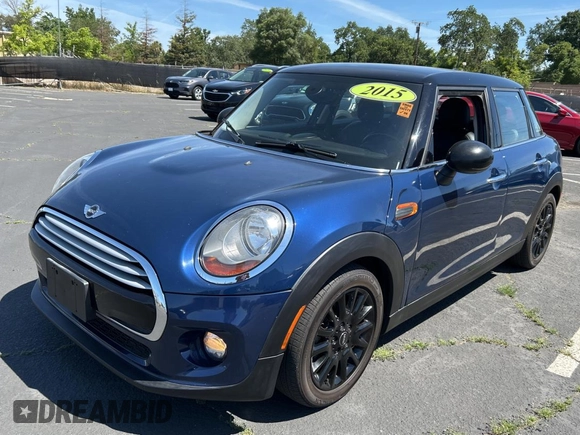 2015 MINI Hardtop 4 Door with VIN WMWXS5C5XFT831166, listed as a Copart auction lot 56714285 with 69,668 mi miles and Salvage Title. Bid and sale history available at DreamBid. Image 2.
