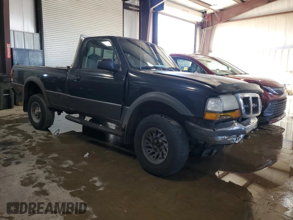 1998 Ford Ranger with VIN 1FTZR11X4WTA25070, listed as a Copart auction lot 47520055 with 177,416 mi miles and Salvage Title. Bid and sale history available at DreamBid. Image 4.