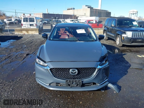 2021 Mazda 6 Carbon Edition with VIN JM1GL1WY3M1603064, listed as a IAAI auction lot 41199852 with 118,307 mi miles and . Bid and sale history available at DreamBid. Image 12.