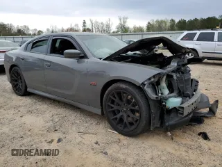 2019 Dodge Charger Scat Pack z VIN 2C3CDXGJ7KH646213, wystawiony jako Copart lot #51653065 z przebiegiem 63 229 mil mil oraz Szkoda całkowita • Salvage title. Historia ofert i sprzedaży dostępna na DreamBid. Obrazek 4.