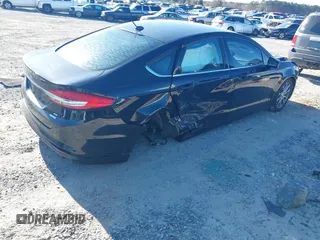 2017 Ford Fusion SE with VIN 3FA6P0HD9HR137825, listed as a IAAI auction lot 41737647 with 128,545 mi miles and . Bid and sale history available at DreamBid. Image 4.