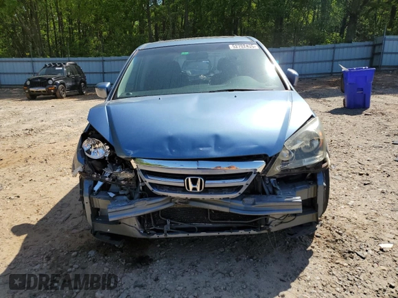 2005 Honda Odyssey EX-L z VIN 5FNRL386X5B034514, wystawiony jako Copart lot #52702435 z przebiegiem 65 988 mil mil oraz Szkoda całkowita • Salvage title. Historia ofert i sprzedaży dostępna na DreamBid. Obrazek 5.