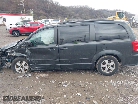 2012 Dodge Grand Caravan SXT with VIN 2C4RDGCG8CR242235, listed as a IAAI auction lot 41922083 with 124,306 mi miles and . Bid and sale history available at DreamBid. Image 14.
