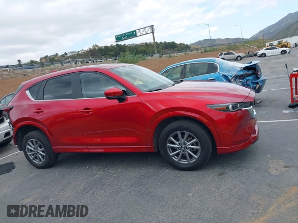 2024 Mazda CX-5 S Carbon Edition z VIN JM3KFBCL3R0431347, wystawiony jako IAAI lot #42057582 z przebiegiem 34 870 mil mil oraz . Historia ofert i sprzedaży dostępna na DreamBid. Obrazek 14.