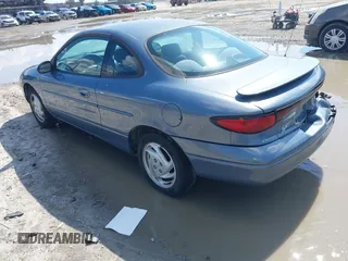 1999 Ford Escort Cool z VIN 3FAKP113XXR218708, wystawiony jako IAAI lot #42255673 z przebiegiem 41 574 mil mil oraz . Historia ofert i sprzedaży dostępna na DreamBid. Obrazek 3.
