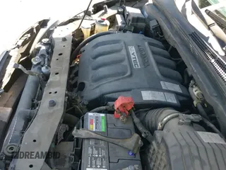 2009 Honda Odyssey EX z VIN 5FNRL38439B015274, wystawiony jako IAAI lot #43409816 z przebiegiem 246 205 mil mil oraz . Historia ofert i sprzedaży dostępna na DreamBid. Obrazek 19.