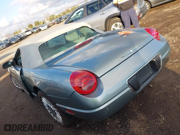 2004 Ford Thunderbird Pacific Coast Roadster with VIN 1FAHP63AX4Y107544, listed as a IAAI auction lot 41441354 with Not Provided miles and . Bid and sale history available at DreamBid. Image 3.