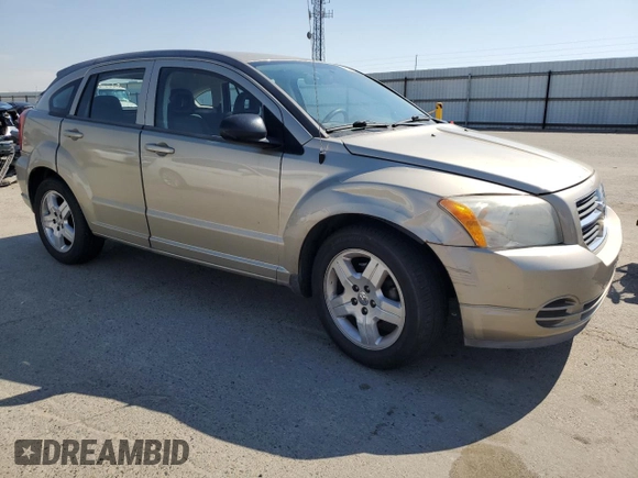 2009 Dodge Caliber SXT z VIN 1B3HB48A19D199410, wystawiony jako Copart lot #55133965 z przebiegiem 141 658 mil mil oraz Szkoda całkowita • Salvage title. Historia ofert i sprzedaży dostępna na DreamBid. Obrazek 4.