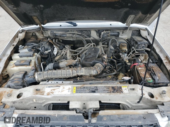 2002 Ford Ranger XLT Off-Road z VIN 1FTZR45U12TA27368, wystawiony jako Copart lot #87229374 z przebiegiem 111 159 mil mil oraz Szkoda całkowita • Salvage title. Historia ofert i sprzedaży dostępna na DreamBid. Obrazek 11.