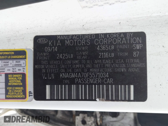2015 Kia Optima LX with VIN KNAGM4A70F5571034, listed as a IAAI auction lot 41734211 with 214,948 mi miles. Bid and sale history available at carsss.com. Image 9.