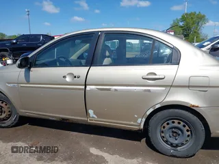 2007 Hyundai Accent GLS with VIN KMHCN46C47U101984, listed as a IAAI auction lot 42234484 with 185,048 mi miles and . Bid and sale history available at DreamBid. Image 14.