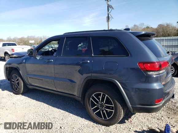 2021 Jeep Grand Cherokee Trailhawk with VIN 1C4RJFLG6MC590810, listed as a Copart auction lot 43708095 with 59,566 mi miles and Salvage Title. Bid and sale history available at carsss.com. Image 2.