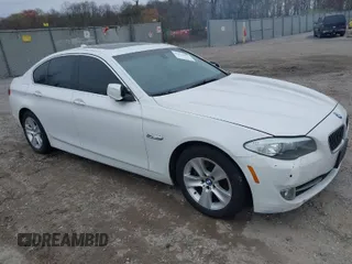 2013 BMW 5 Series 528i xDrive with VIN WBAXH5C5XDD106981, listed as a IAAI auction lot 42012477 with 140,259 mi miles. Bid and sale history available at carsss.com. Image 1.