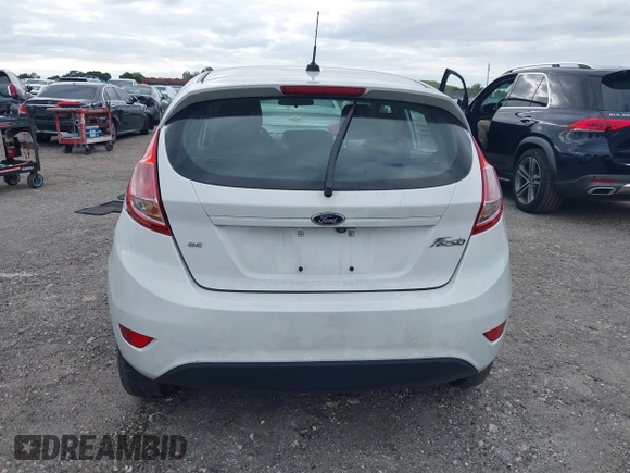2019 Ford Fiesta SE z VIN 3FADP4EJ5KM132862, wystawiony jako IAAI lot #40893430 z przebiegiem 91 011 mil mil oraz . Historia ofert i sprzedaży dostępna na DreamBid. Obrazek 16.