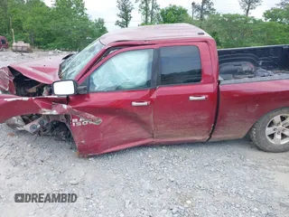 2014 Ram 1500 SLT z VIN 1C6RR6GT6ES408358, wystawiony jako IAAI lot #42038597 z przebiegiem Nie podano mil oraz . Historia ofert i sprzedaży dostępna na DreamBid. Obrazek 14.