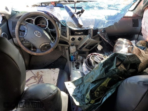 2009 Toyota Tacoma with VIN 3TMLU42N49M038021, listed as a Copart auction lot 46550315 with 103,531 mi miles and Salvage Title. Bid and sale history available at DreamBid. Image 8.