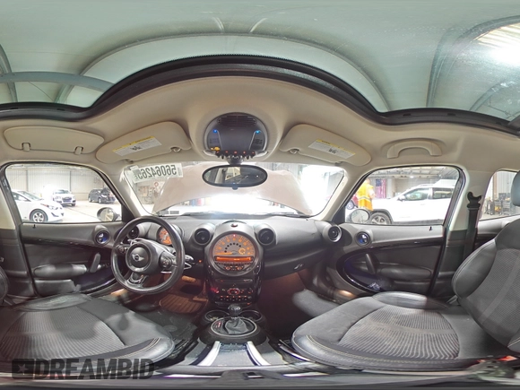 2012 MINI Countryman with VIN WMWZB3C52CWM01672, listed as a Copart auction lot 56064265 with 97,267 mi miles and Salvage Title. Bid and sale history available at DreamBid. Image 14.
