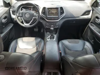 2015 Jeep Cherokee Trailhawk with VIN 1C4PJMBS8FW717950, listed as a Copart auction lot 60321625 with 155,210 mi miles and Salvage title. Bid and sale history available at DreamBid. Image 8.