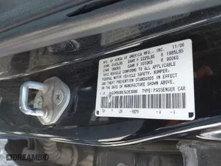 2007 Honda Accord Sdn EX-L with VIN 1HGCM56867A063086, listed as a IAAI auction lot 41979774 with 199,101 mi miles. Bid and sale history available at carsss.com. Image 9.