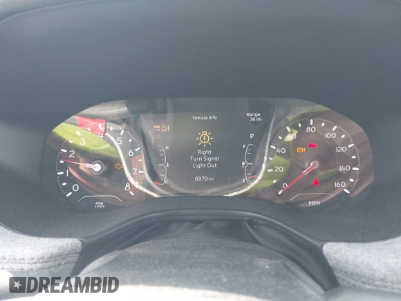 2023 Jeep Compass Latitude Lux z VIN 3C4NJDFN8PT531229, wystawiony jako IAAI lot #42383427 z przebiegiem 6 979 mil mil oraz . Historia ofert i sprzedaży dostępna na DreamBid. Obrazek 7.