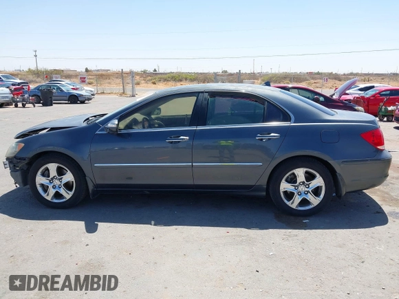 2005 Acura RL z VIN JH4KB16505C012679, wystawiony jako IAAI lot #41976411 z przebiegiem 103 342 mil mil oraz . Historia ofert i sprzedaży dostępna na DreamBid. Obrazek 15.