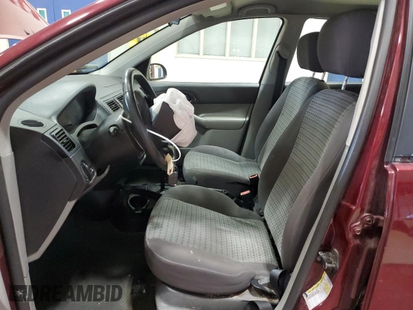 2006 Ford Focus S z VIN 1FAFP34N76W153239, wystawiony jako Copart lot #53085555 z przebiegiem 118 259 mil mil oraz Szkody całkowita. Historia ofert i sprzedaży dostępna na DreamBid. Obrazek 7.