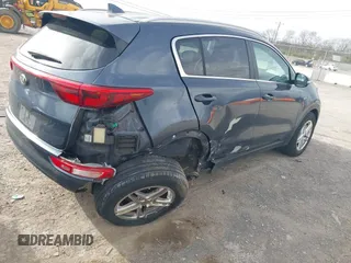 2018 Kia Sportage LX with VIN KNDPMCAC9J7363466, listed as a IAAI auction lot 41841061 with 98,154 mi miles and . Bid and sale history available at DreamBid. Image 4.