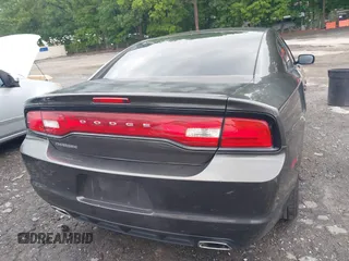 2013 Dodge Charger SE z VIN 2C3CDXBG8DH629628, wystawiony jako IAAI lot #42199220 z przebiegiem 153 556 mil mil oraz . Historia ofert i sprzedaży dostępna na DreamBid. Obrazek 16.