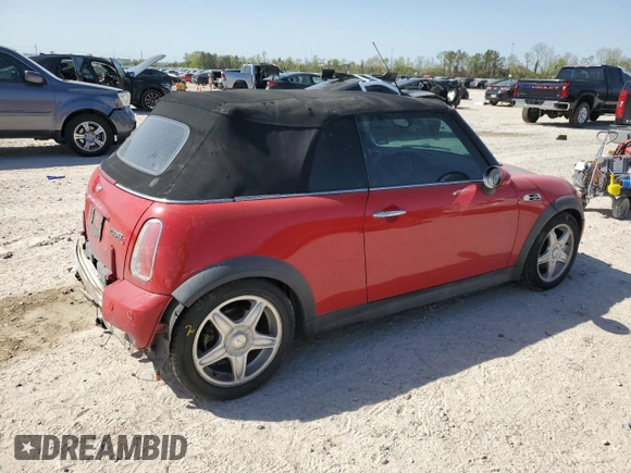 2005 MINI Convertible S with VIN WMWRH33535TF84456, listed as a Copart auction lot 50120725 with 149,840 mi miles and Salvage Title. Bid and sale history available at DreamBid. Image 3.