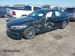 2019 BMW 5 Series M550i xDrive with VIN WBAJB9C51KB464879, listed as a IAAI auction lot 41774834 with 77,379 mi miles and . Bid and sale history available at DreamBid. Image 2.