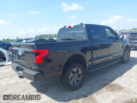 2024 Ford F-150 Lightning XLT with VIN 1FTVW3LK8RWG20320, listed as a IAAI auction lot 41960103 with Not provided miles and . Bid and sale history available at DreamBid. Image 4.