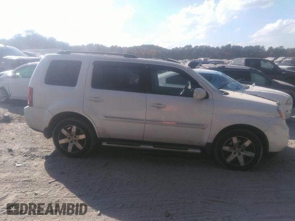 2012 Honda Pilot Touring with VIN 5FNYF3H92CB027292, listed as a IAAI auction lot 40617936 with 140,455 mi miles and . Bid and sale history available at carsss.com. Image 13.