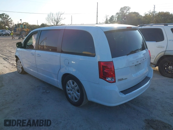 2014 Dodge Grand Caravan SE with VIN 2C4RDGBG1ER220534, listed as a IAAI auction lot 41262990 with 77,851 mi miles and . Bid and sale history available at DreamBid. Image 3.