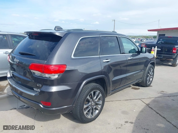 2017 Jeep Grand Cherokee Overland with VIN 1C4RJECG1HC614740, listed as a IAAI auction lot 41912523 with 177,353 mi miles. Bid and sale history available at carsss.com. Image 4.