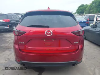 2019 Mazda CX-5 Touring with VIN JM3KFACM7K0696815, listed as a IAAI auction lot 41921763 with 46,900 mi miles. Bid and sale history available at carsss.com. Image 17.