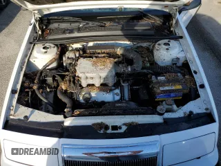 1990 Chrysler LeBaron z VIN 1C3XJ4533LG472070, wystawiony jako Copart lot #74314104 z przebiegiem 97 354 mil mil oraz Szkody całkowita. Historia ofert i sprzedaży dostępna na DreamBid. Obrazek 11.
