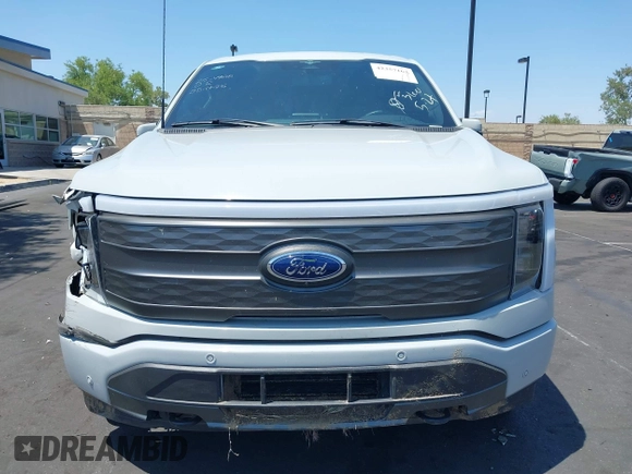 2023 Ford F-150 Lightning Pro z VIN 1FTVW1EL3PWG20829, wystawiony jako IAAI lot #42357162 z przebiegiem 52 553 mil mil oraz . Historia ofert i sprzedaży dostępna na DreamBid. Obrazek 13.
