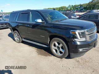 2016 Chevrolet Tahoe LTZ z VIN 1GNSKCKC0GR215631, wystawiony jako IAAI lot #42287767 z przebiegiem 95 659 mil mil oraz . Historia ofert i sprzedaży dostępna na DreamBid. Obrazek 1.