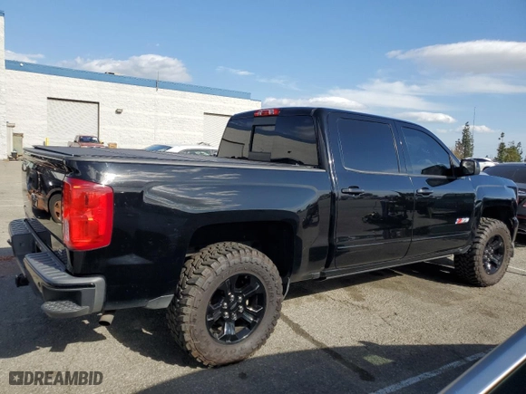 2017 Chevrolet Silverado 1500 LTZ with VIN 3GCUKSECXHG440566, listed as a Copart auction lot 51677165 with 140,659 mi miles and Salvage Title. Bid and sale history available at carsss.com. Image 3.
